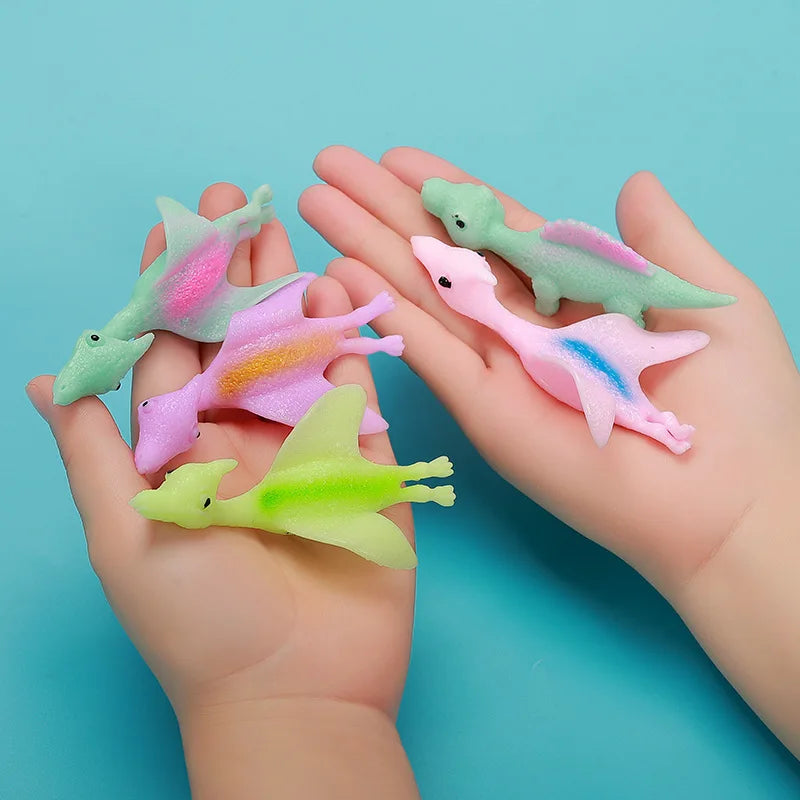 Slingshot Dinosaur Finger Toy - 10 Pcs